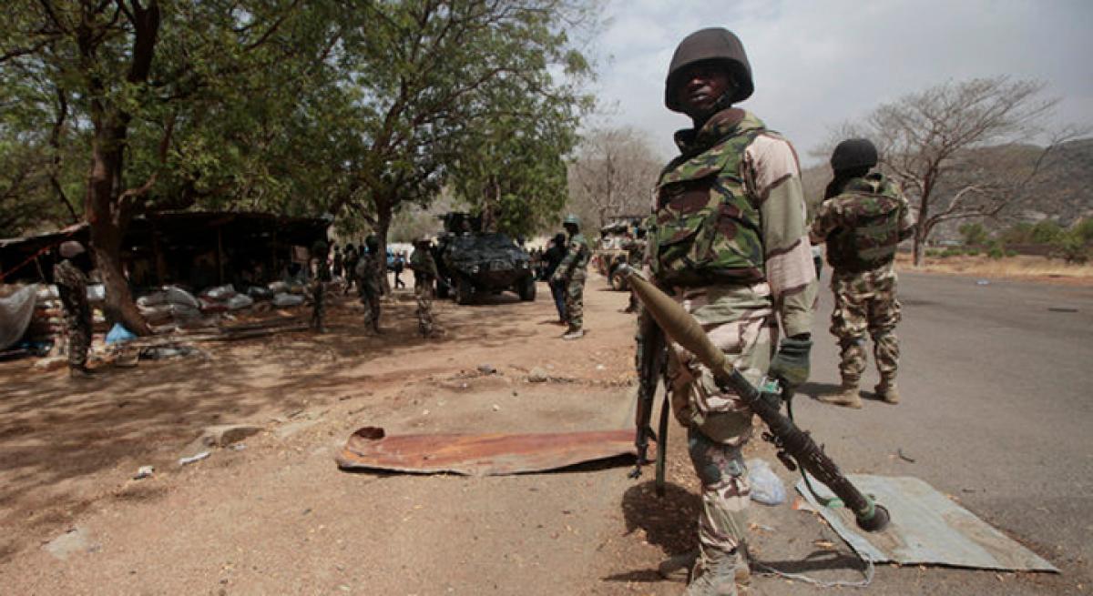 Boko Haram blasts in Nigerian towns kill 49